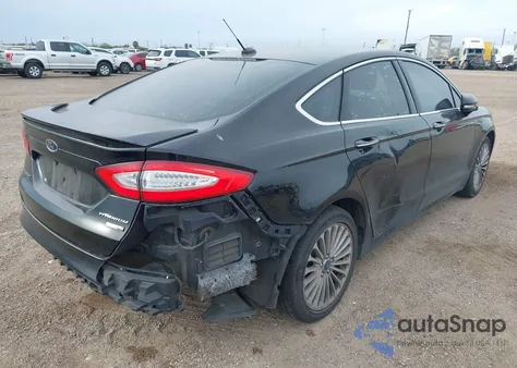 2016 Ford Fusion Titanium из США, поврежденный, VIN 3FA6P0D9XGR346121